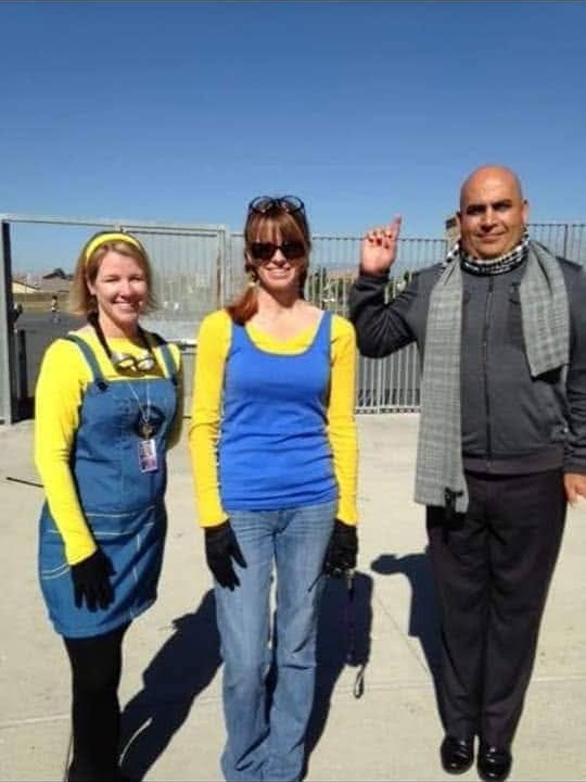 School staff in character costumes