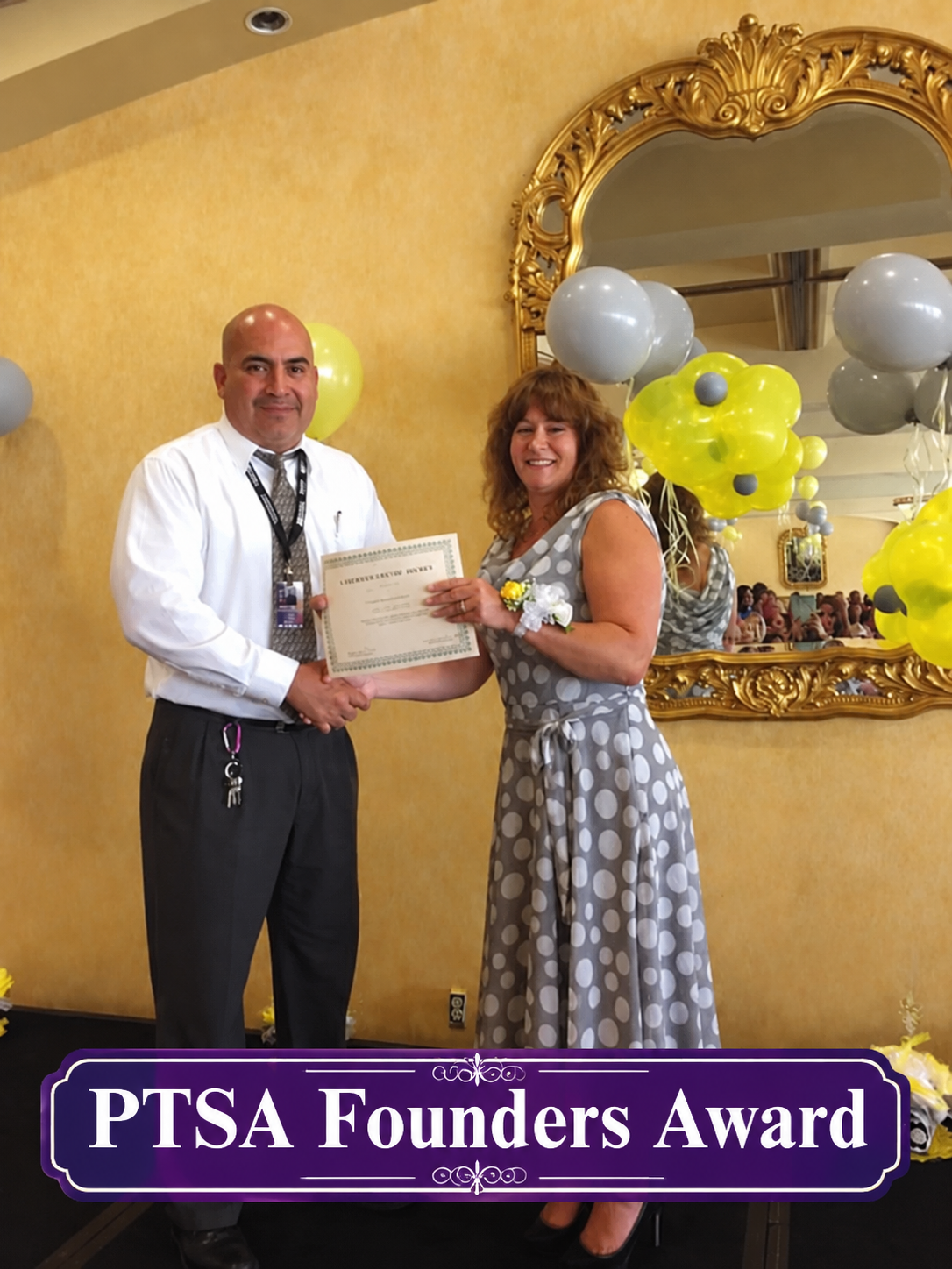 Raul receiving a PTSA Founders Award certificate